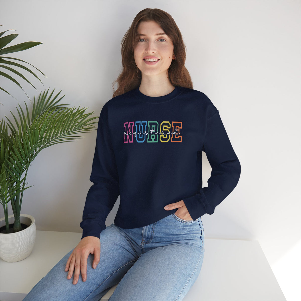 Colorful Rainbow Whimsical Varsity Registered Nurse Gildan Unisex Heavy Blend™ Crewneck Sweatshirt