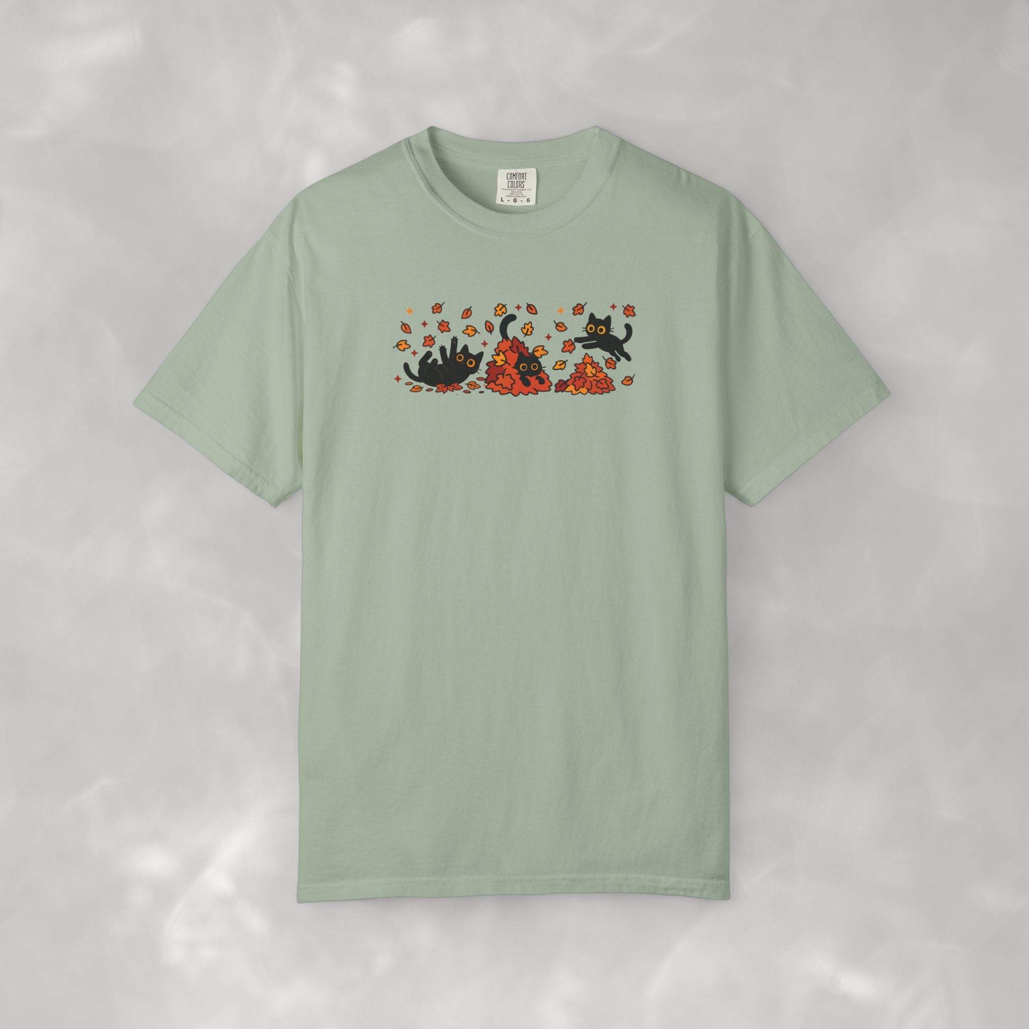 Cute Black Cats Playing in Autumn Leaves Comfort Colors Tee