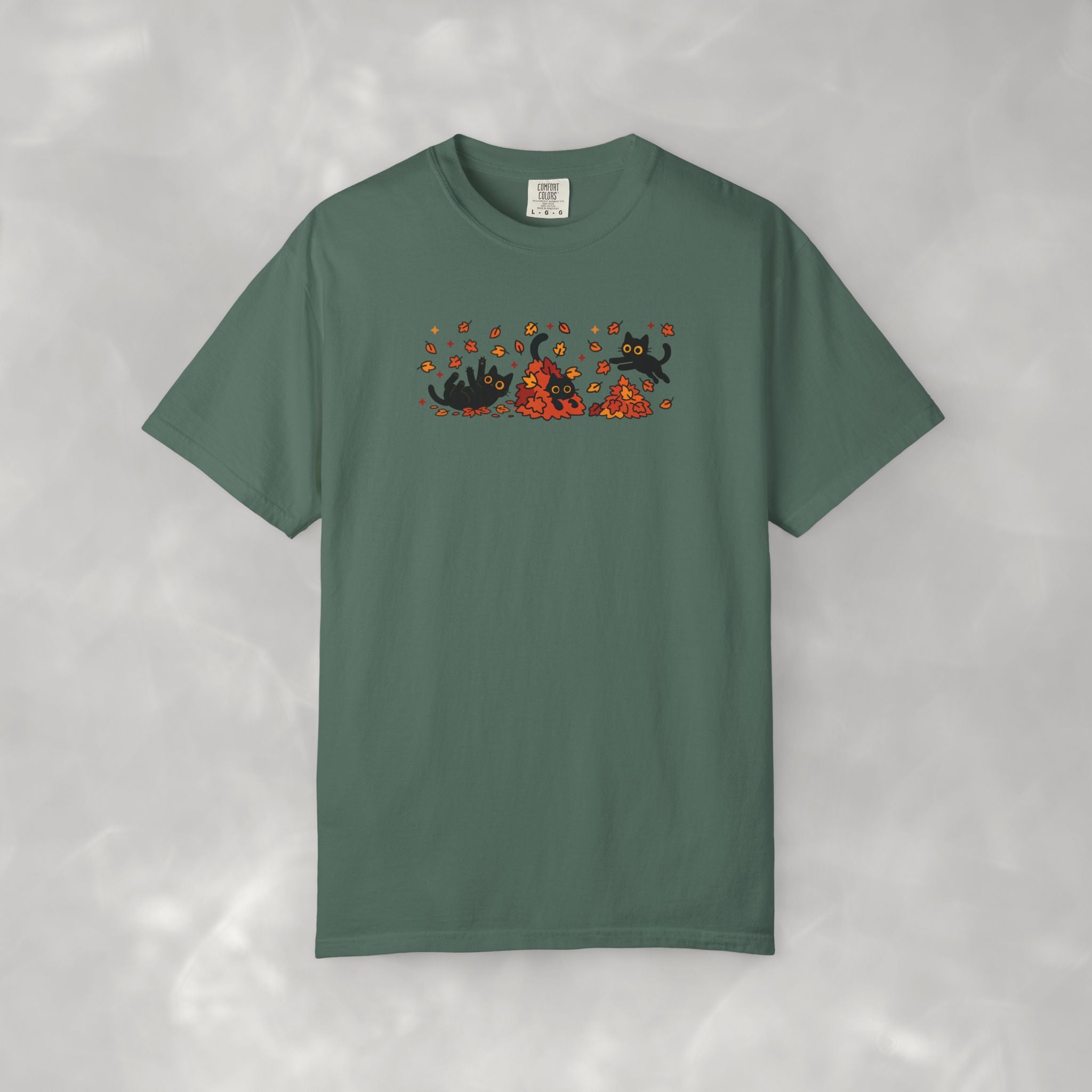 Cute Black Cats Playing in Autumn Leaves Comfort Colors Tee