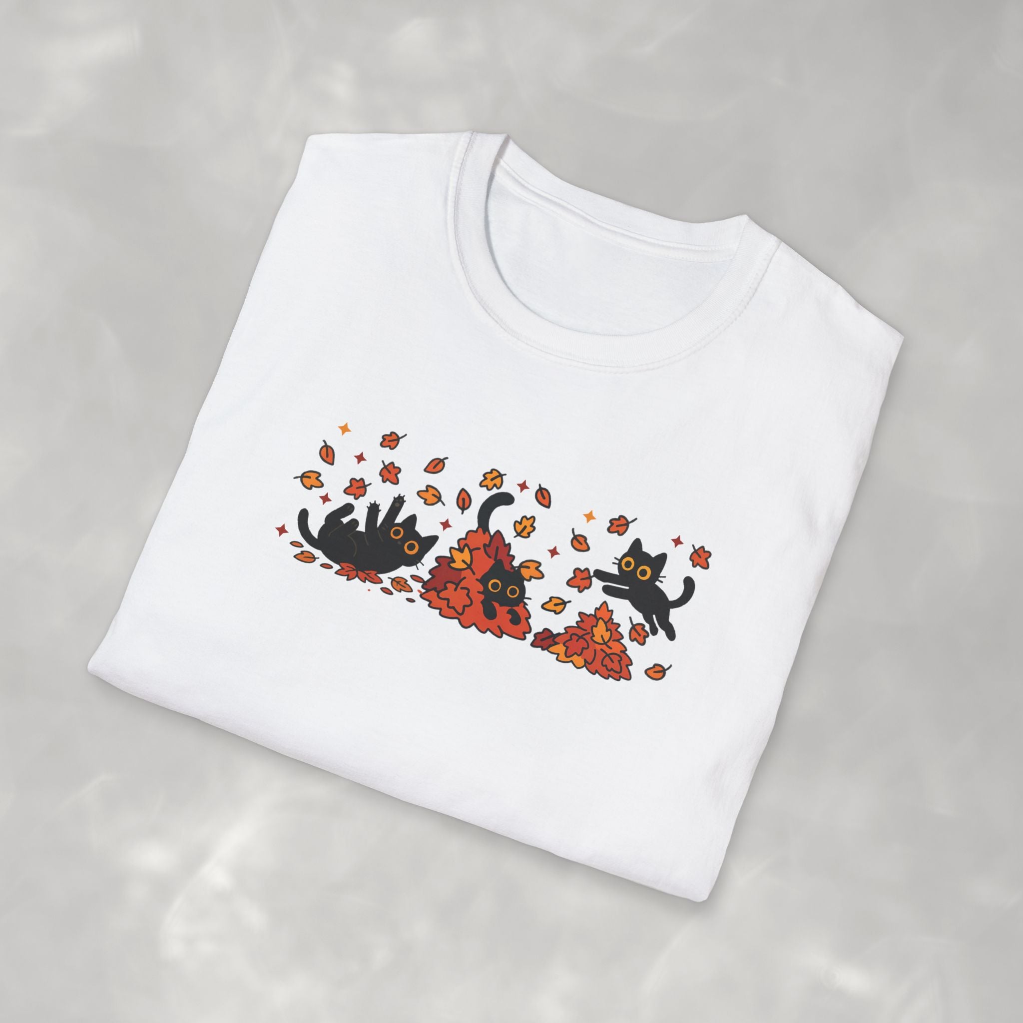 Black Cats Playing in Autum Leaves Gildan Unisex Softstyle T-Shirt