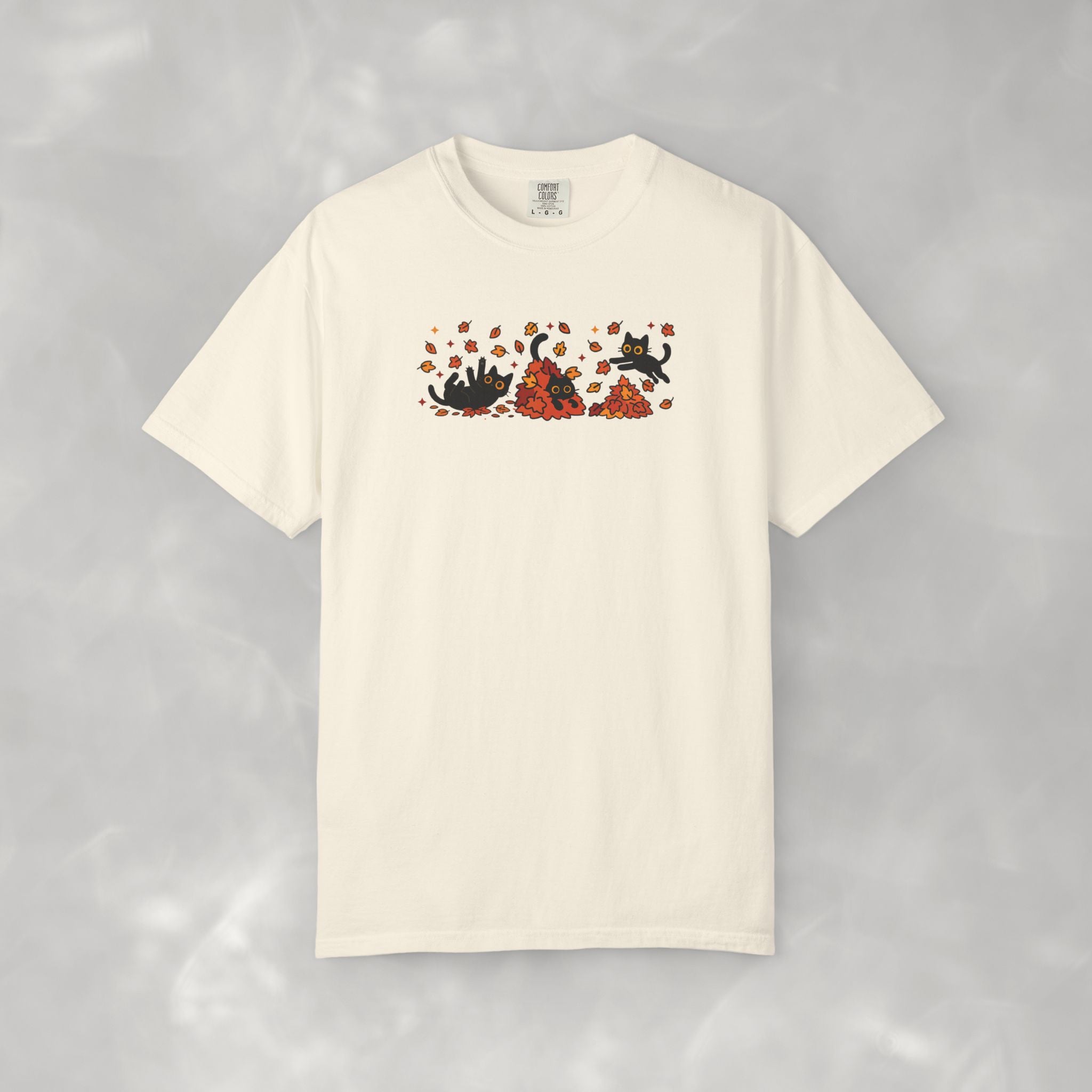 Cute Black Cats Playing in Autumn Leaves Comfort Colors Tee
