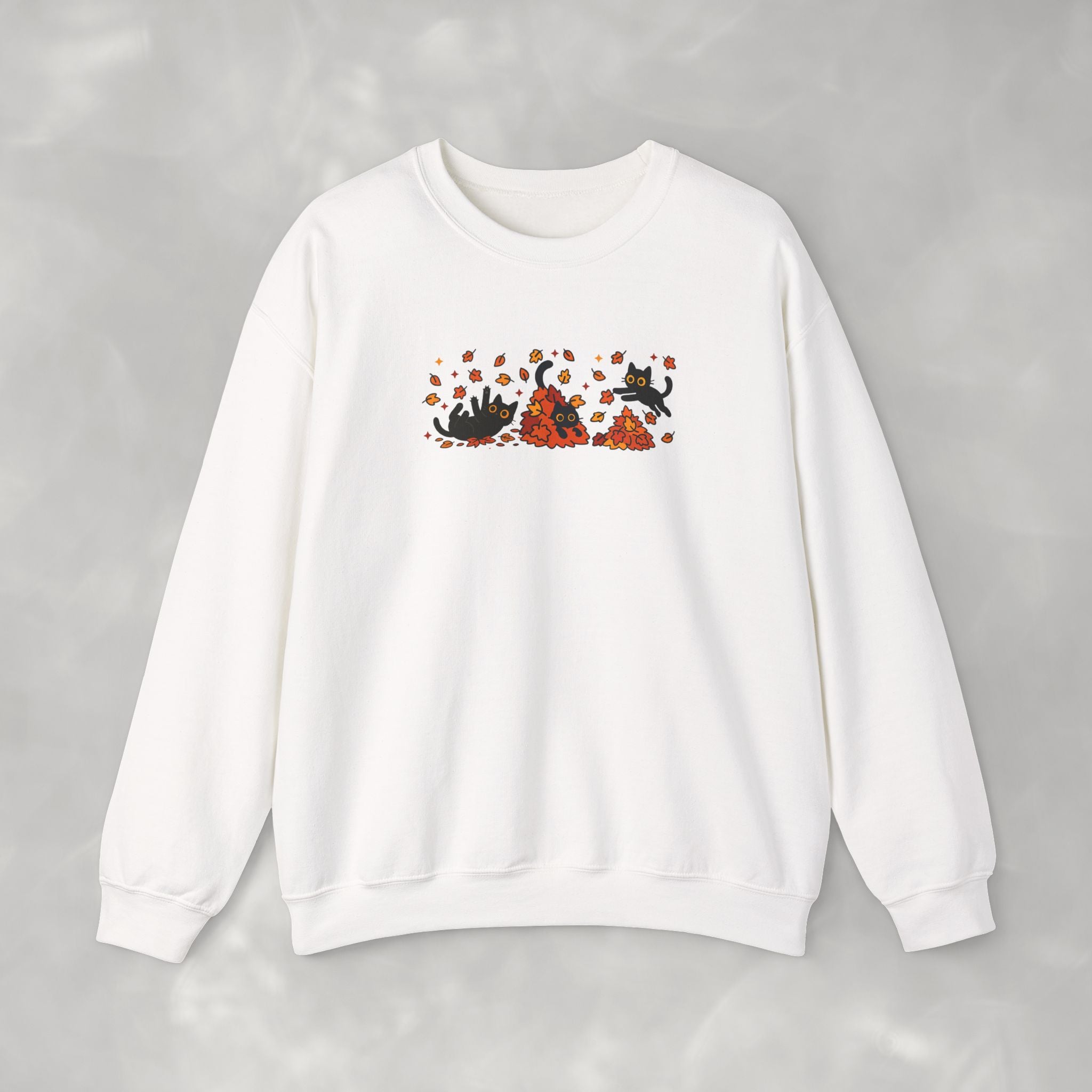 Cute Black Cats Playing in Autumn Leaves, Gildan Unisex Heavy Blend™ Crewneck Sweatshirt