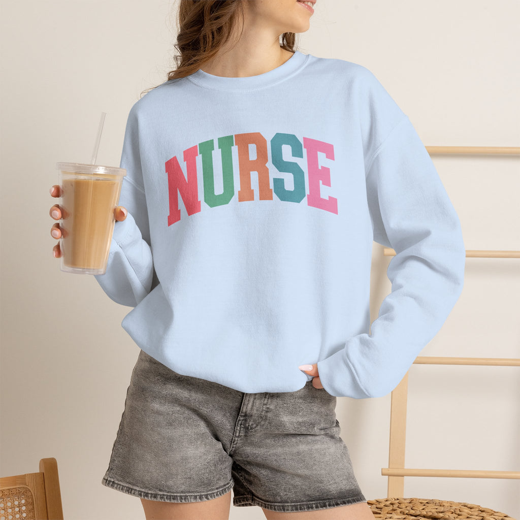Colorful Fun Whimsical Varsity Nurse Gildan Unisex Heavy Blend™ Crewneck Sweatshirt for RN, LPN, GN, Student Nurse