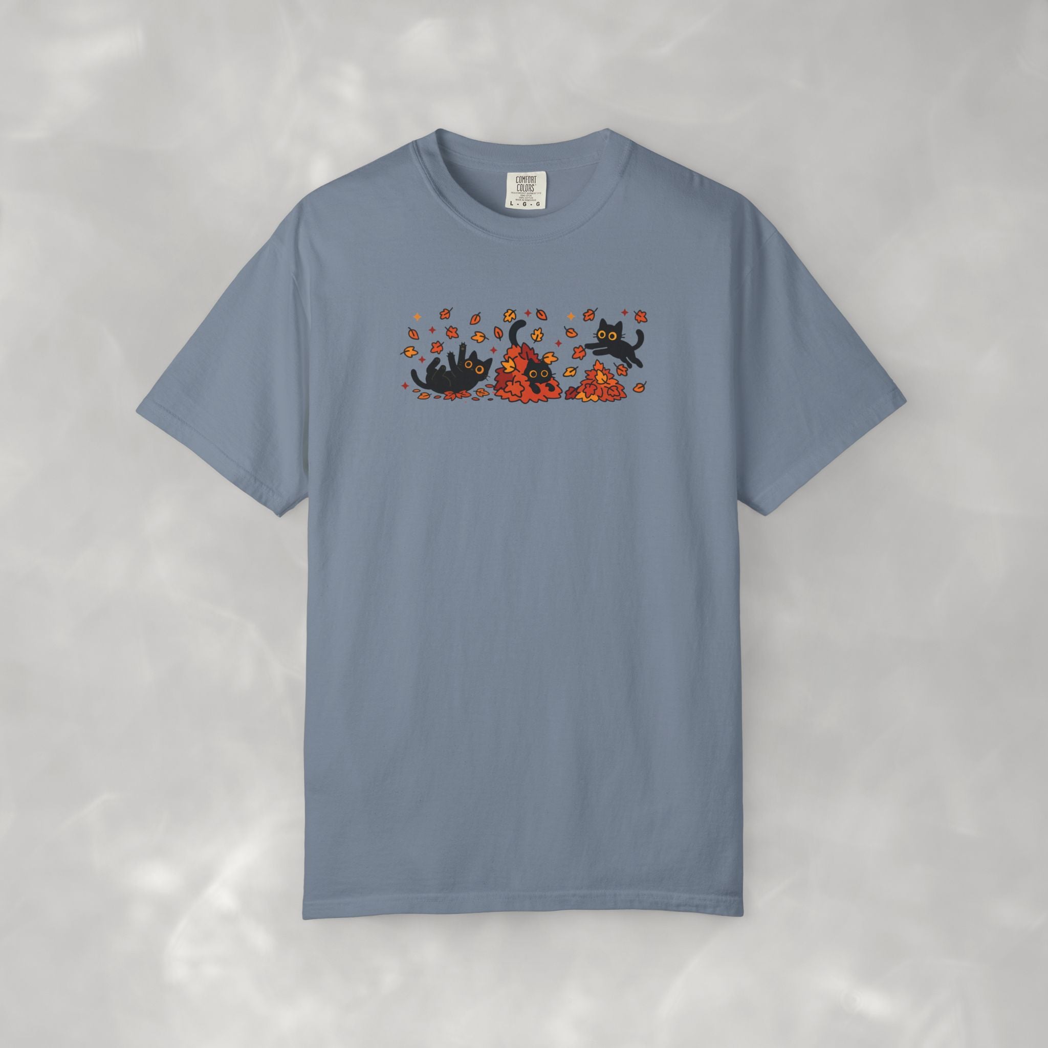 Cute Black Cats Playing in Autumn Leaves Comfort Colors Tee