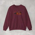 Cute Black Cats Playing in Autumn Leaves, Gildan Unisex Heavy Blend™ Crewneck Sweatshirt