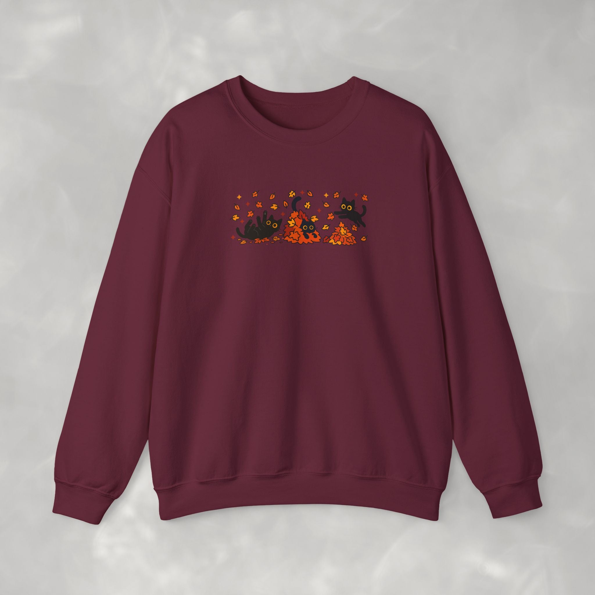 Cute Black Cats Playing in Autumn Leaves, Gildan Unisex Heavy Blend™ Crewneck Sweatshirt