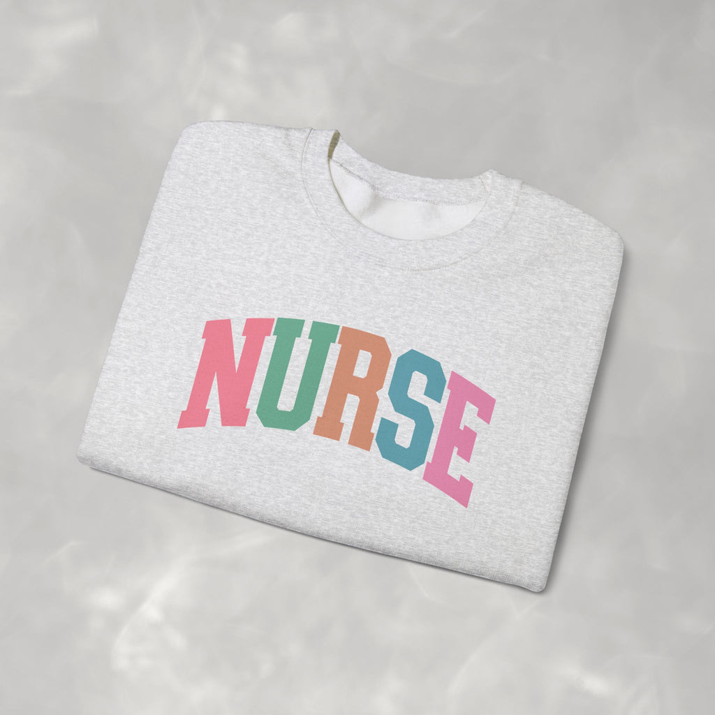 Colorful Fun Whimsical Varsity Nurse Gildan Unisex Heavy Blend™ Crewneck Sweatshirt for RN, LPN, GN, Student Nurse