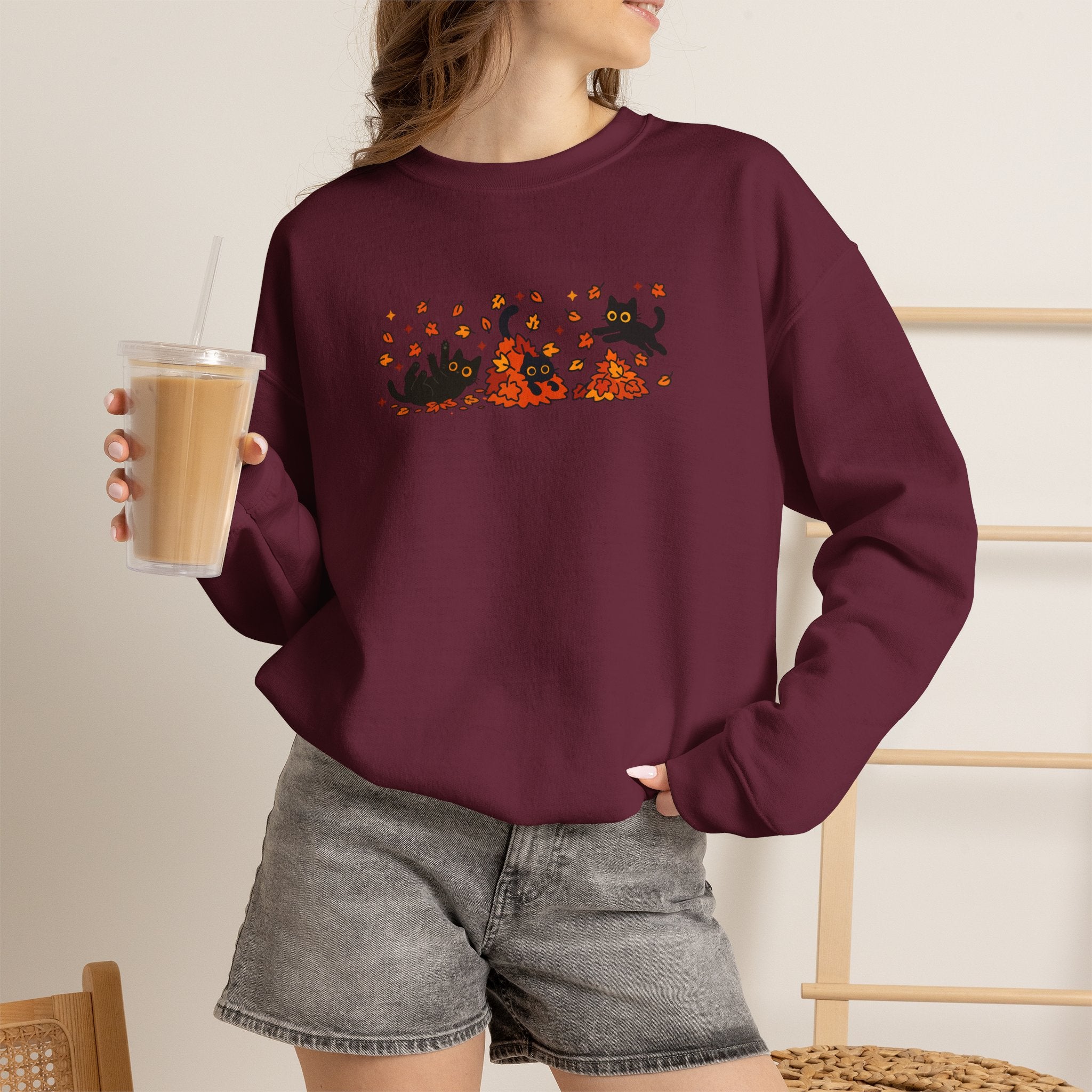Cute Black Cats Playing in Autumn Leaves, Gildan Unisex Heavy Blend™ Crewneck Sweatshirt