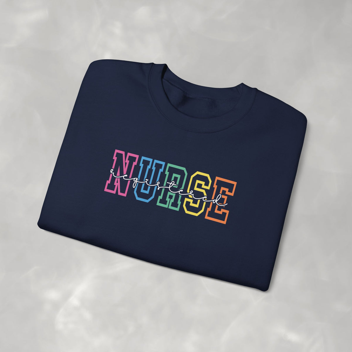 Colorful Rainbow Whimsical Varsity Registered Nurse Gildan Unisex Heavy Blend™ Crewneck Sweatshirt
