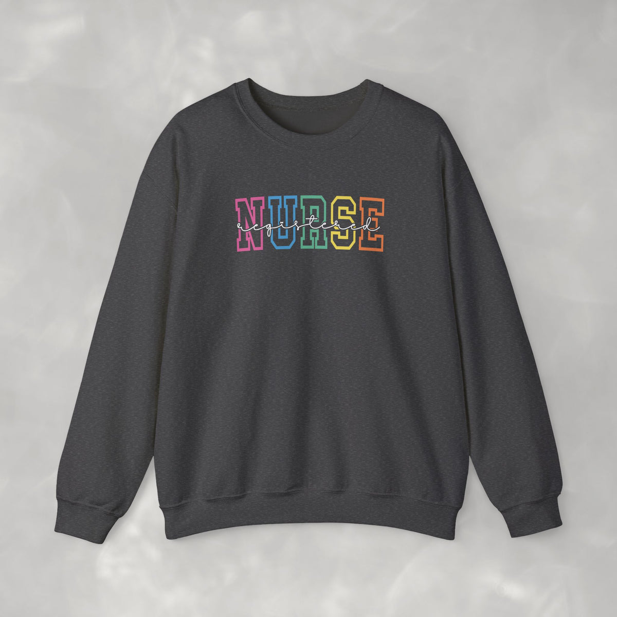 Colorful Rainbow Whimsical Varsity Registered Nurse Gildan Unisex Heavy Blend™ Crewneck Sweatshirt