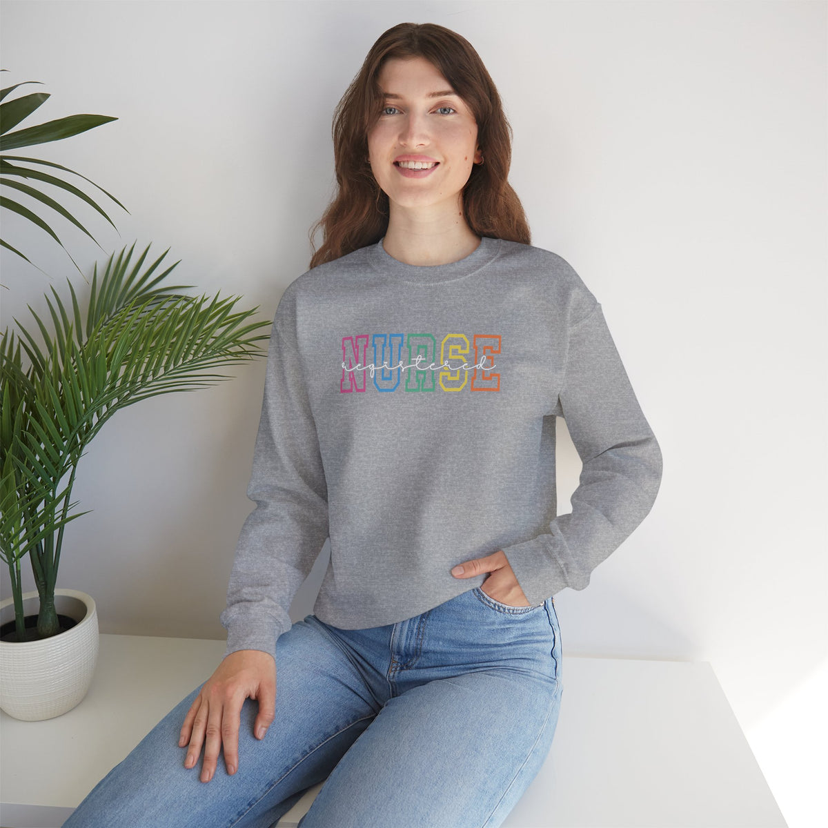 Colorful Rainbow Whimsical Varsity Registered Nurse Gildan Unisex Heavy Blend™ Crewneck Sweatshirt
