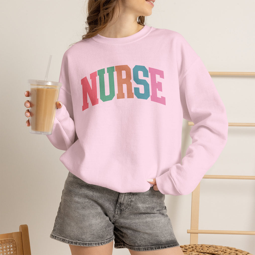 Colorful Fun Whimsical Varsity Nurse Gildan Unisex Heavy Blend™ Crewneck Sweatshirt for RN, LPN, GN, Student Nurse
