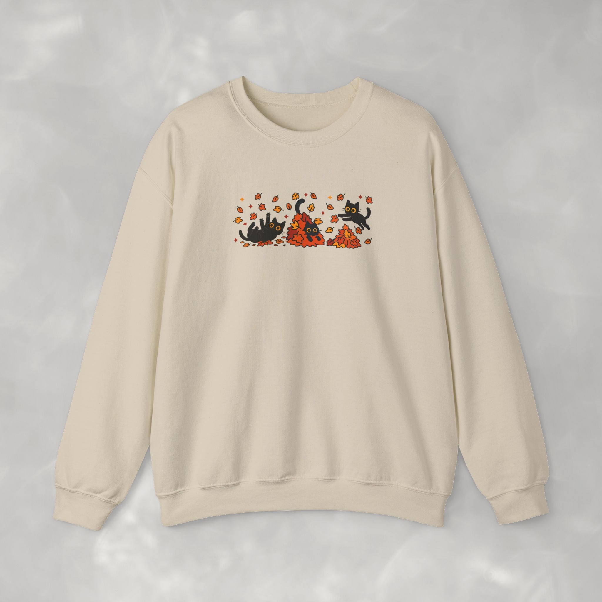 Cute Black Cats Playing in Autumn Leaves, Gildan Unisex Heavy Blend™ Crewneck Sweatshirt