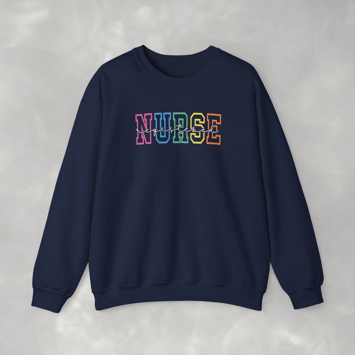 Colorful Rainbow Whimsical Varsity Registered Nurse Gildan Unisex Heavy Blend™ Crewneck Sweatshirt