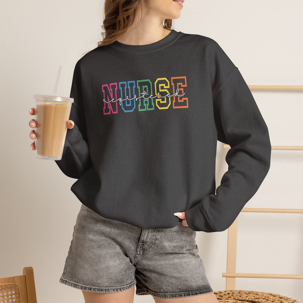 Colorful Rainbow Whimsical Varsity Registered Nurse Gildan Unisex Heavy Blend™ Crewneck Sweatshirt